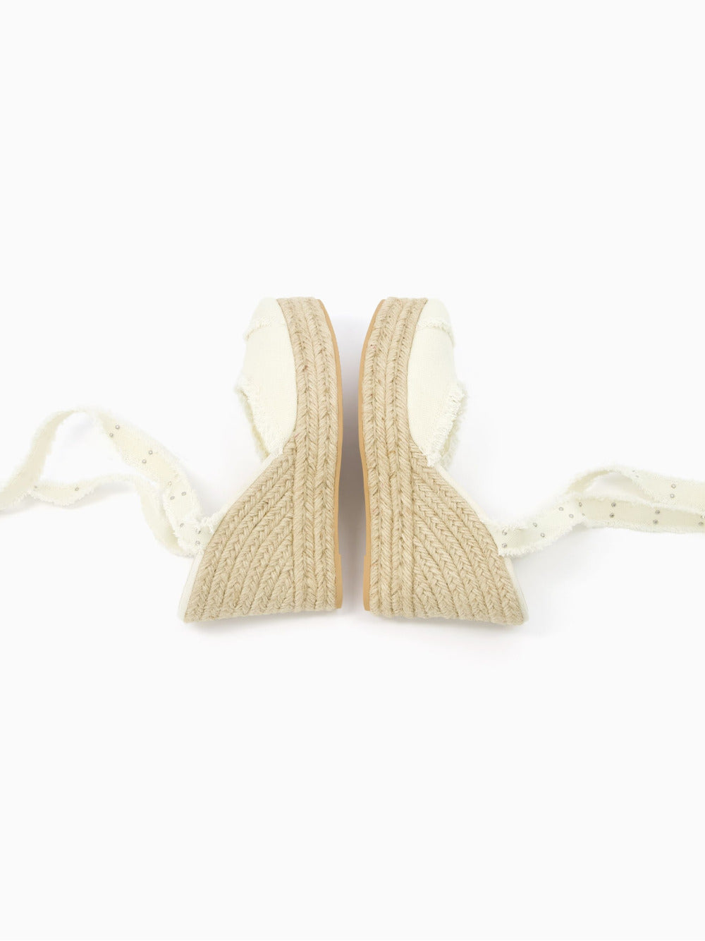 Zeppe in juta stringate con borchie